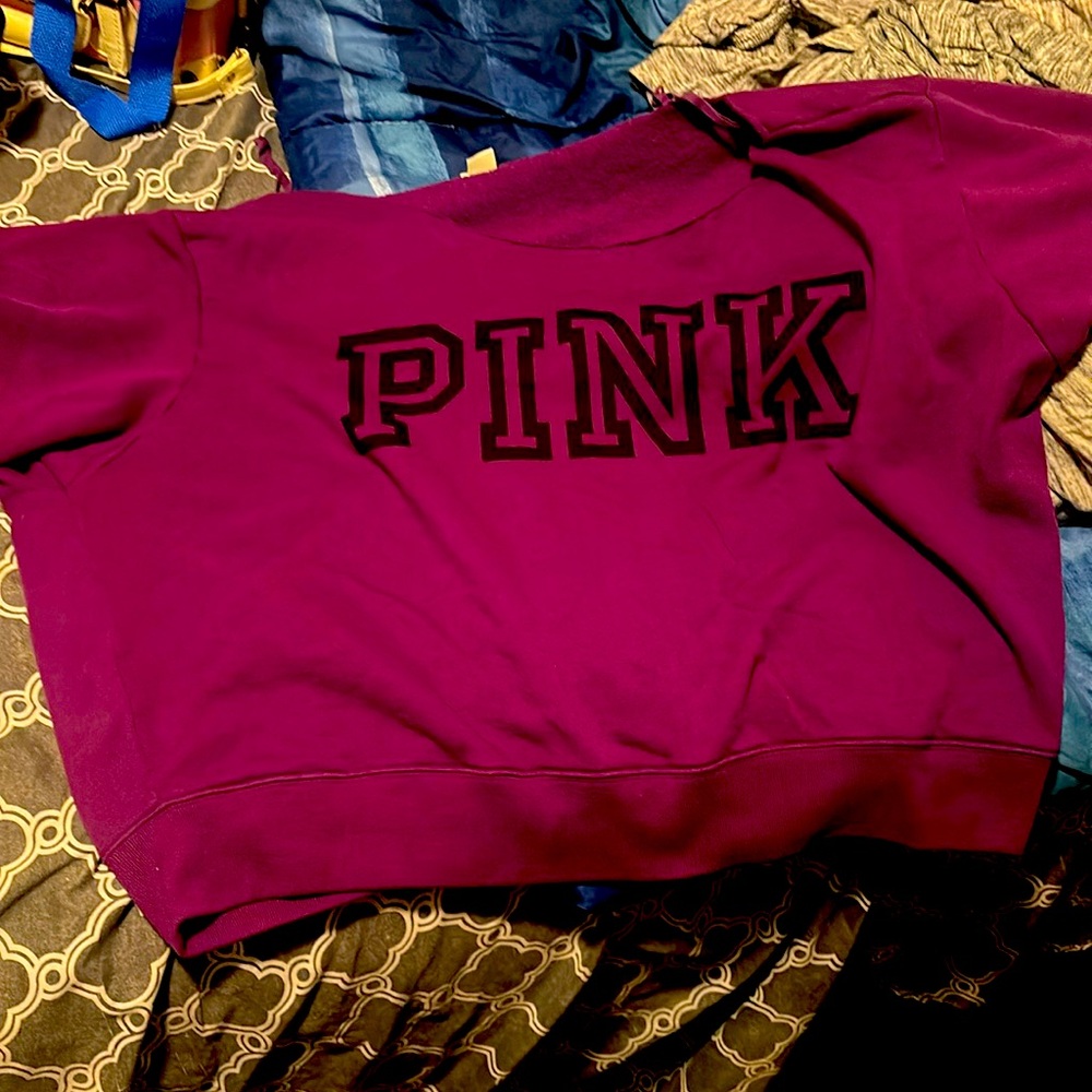 This is a purple pink off the shoulder sweater size2x